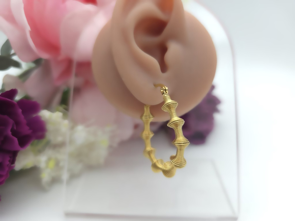 Spiral Creolen Ohrringe goldfarben Edelstahl